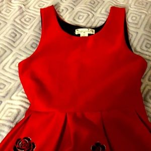 Red and black knitwork’s girls dress